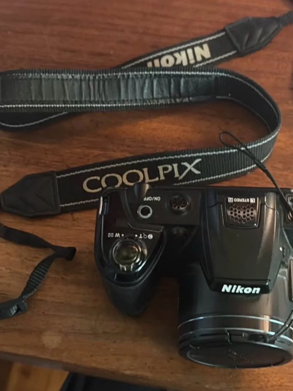 Nikon Coolpix L120 point and shoot camera with strap, lens cap, & 128gb SD card